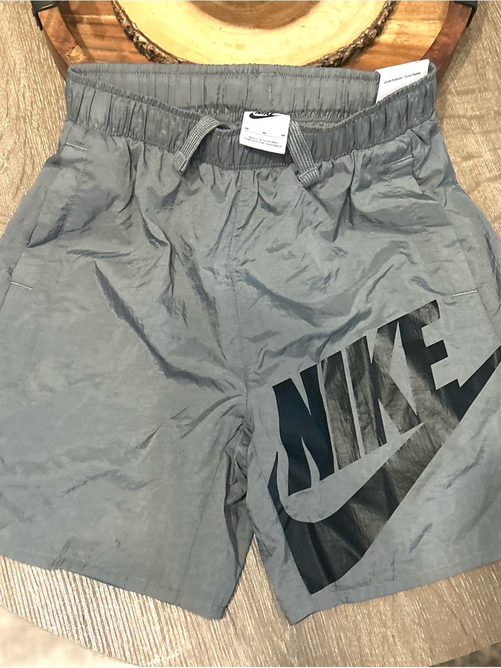 Nike Men's Gray Athletic Shorts with Black Logo